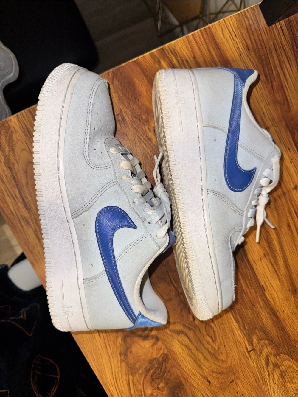Nike White Sneakers with Blue Swoosh